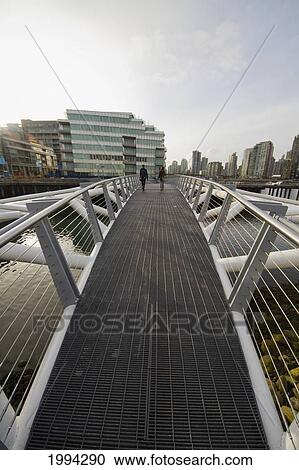 Stock Image - Southeast False Creek Seawall By The Vancouver Olympic Village, Vancouver, British Columbia, Canada. Fotosearch
