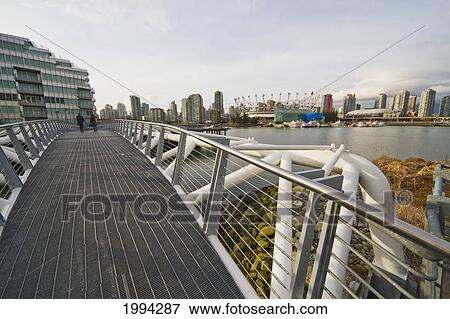 Stock Photo - Southeast False Creek Seawall By The Vancouver Olympic Village, Vancouver, British Columbia, Canada. Fotosearch