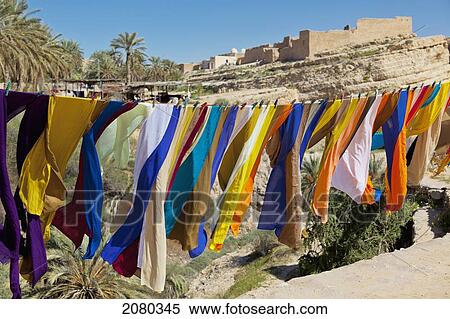 Souvenir Scarves Flap In The Breeze Above The Canyon Near The Algerian Border; Mides, Tunisia, North Africa View Large Photo Image Stock Photography - Souvenir Scarves Flap In The Breeze Above The Canyon Near The Algerian Border; Mides, Tunisia, North Africa. Fotosearch
