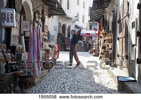 Stock Photo - Souvenir Seller At The Old Bridge Area In Mostar, Herzegovina-Neretva, Bosnia And Herzegovina. Fotosearch