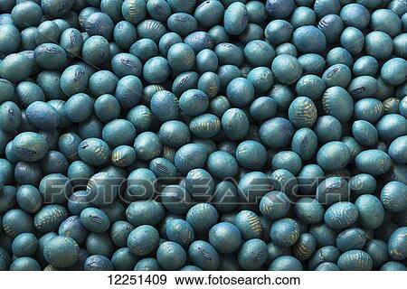 Soybean seeds that have been treated with a protective anti-fungal coating for planting View Large Photo Image Stock Photo - Soybean seeds that have been treated with a protective anti-fungal coating for planting. Fotosearch