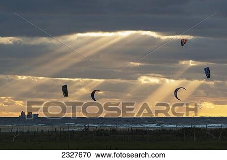 Stock Image - Spain, Andalusia, Cadiz, Costa de la Luz, Parasurfing; Tarifa. Fotosearch