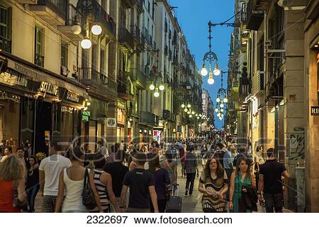 Stock Photo - Spain, Busy Carrer Ferran at night; Barcelona. Fotosearch