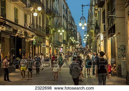 Stock Photo - Spain, Busy Carrer Ferran at night; Barcelona. Fotosearch