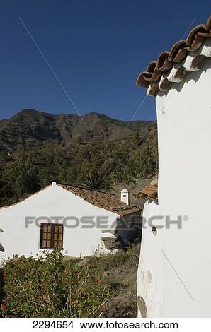 Spain, Canary Islands, Island of La Gomera, Village of Benchijigua in Integral Nature Reserve; Santiago Ravine View Large Photo Image Picture - Spain, Canary Islands, Island of La Gomera, Village of Benchijigua in Integral Nature Reserve; Santiago Ravine. Fotosearch