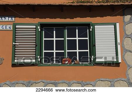 Stock Photograph - Spain, Canary Islands, Island of La Gomera, Valle Gran Rey, Pottery shop with shuttered window; El Cercado. Fotosearch