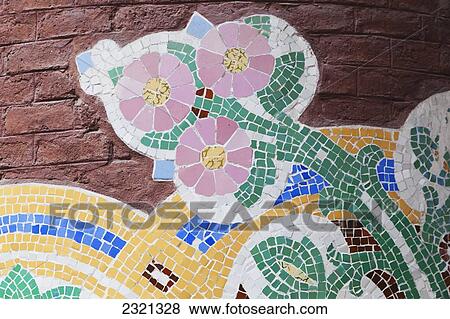 Stock Photo - Spain, Catalonia, Barcelona, Mosaic of colorful ceramic tile on Modernista building. Fotosearch