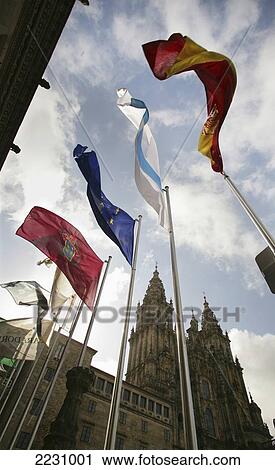 Spain, Galicia, Flags Flying In Front Of Cathedral; Santiago De Compostela View Large Photo Image Stock Image - Spain, Galicia, Flags Flying In Front Of Cathedral; Santiago De Compostela. Fotosearch