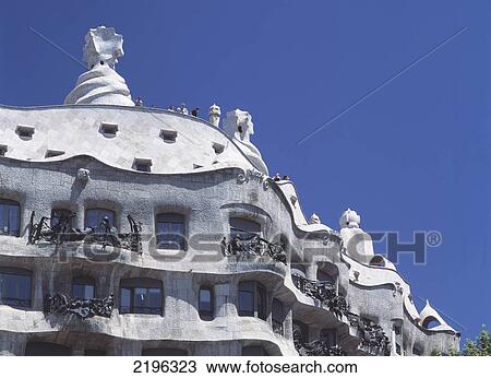 Stock Image - Spain, Gaudi building; Barcelona, Casa Mila, Tourists on top of La Pedrera. Fotosearch