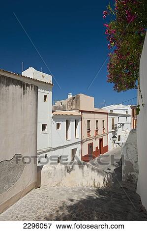 Spain, Ibiza, Looking down alley in Dalt Vila; Ibiza Town View Large Photo Image Stock Photo - Spain, Ibiza, Looking down alley in Dalt Vila; Ibiza Town. Fotosearch