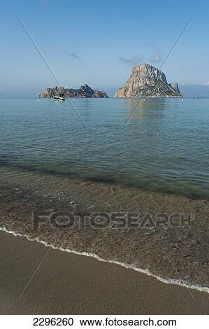Spain, Ibiza, Looking out to Es Vedra Island; Cala d'Hort beach View Large Photo Image Stock Image - Spain, Ibiza, Looking out to Es Vedra Island; Cala d'Hort beach. Fotosearch
