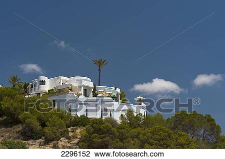 Spain, Ibiza, Villa on hillside; Es Jondal View Large Photo Image Stock Image - Spain, Ibiza, Villa on hillside; Es Jondal. Fotosearch