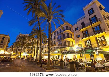 Stock Image - Spain, Majorca, Cafes at dusk; Palma. Fotosearch