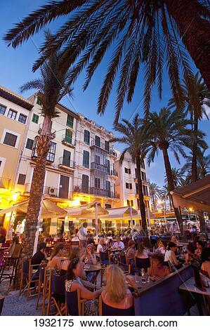 Spain, Majorca, Crowded cafes at dusk; Palma View Large Photo Image Stock Photography - Spain, Majorca, Crowded cafes at dusk; Palma. Fotosearch
