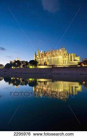 Stock Photograph - Spain, Majorca, Looking across Parc del Mar to cathedral; Palma. Fotosearch