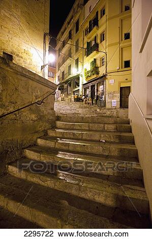 Stock Image - Spain, Majorca, Steps in alley at night; Palma. Fotosearch