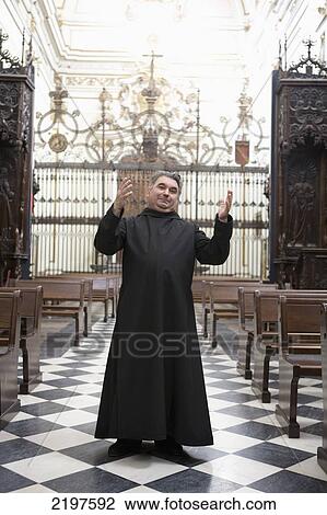 Stock Image - Spain, Monk; Rascafria, Santa Maria El Paular Monastery. Fotosearch