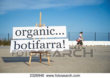Stock Photograph - Spain, Parc del Forum; Barcelona, Sing for traditional catalan sausage at Primavera Sound music festival. Fotosearch