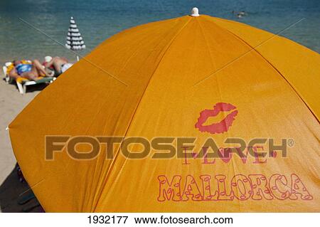 Stock Photo - Spain, Port Soller; Majorca, Beach umbrella. Fotosearch