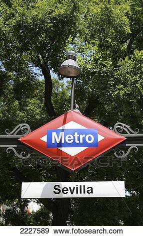 Stock Photo - Spain, Sevilla Station; Madrid, Metro Sign. Fotosearch