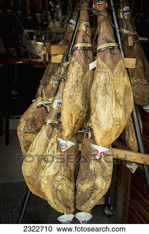 Stock Image - Spain, Traditional hamon on sale; Barcelona. Fotosearch