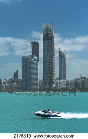 Stock Photo - Speedboat In The Bay In Front Of Abu Dhabi, Abu Dhabi, United Arab Emirates. Fotosearch
