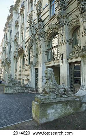 Stock Image - Sphinxes In Front Of The Art Nouveau Building Designed By Mikhail Eisenstein On 2A Alberta Street, Riga, Latvia. Fotosearch