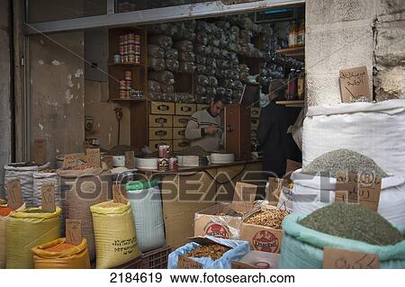 Spice Merchant In The Balad Souk Market In The Heart Of Amman's Old City, Jordan, Middle East View Large Photo Image Stock Photo - Spice Merchant In The Balad Souk Market In The Heart Of Amman's Old City, Jordan, Middle East. Fotosearch