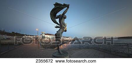Spirit Of South Shields Statue At Sunset Along The River Tyne; South Shields, Tyne And Wear, England View Large Photo Image Stock Image - Spirit Of South Shields Statue At Sunset Along The River Tyne; South Shields, Tyne And Wear, England. Fotosearch