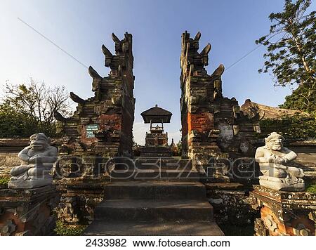 Stock Image - Split gate (candi bentar) of the Royal Water Temple Pura Taman Ayun, Mengwi, Bali, Indonesia. Fotosearch