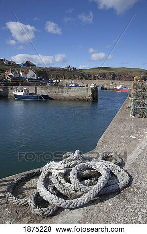 Stock Photo - St. Abbs Head, Berwickshire, Scottish Borders, Scotland; A Rope Laying On A Pier. Fotosearch