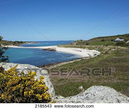 Stock Image - St Agnes Viewed From The Island Of Gugh Showing The Sand Bar (Tombolo), Isles Of Scilly, Cornwall, Uk, Europe. Fotosearch