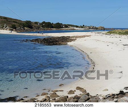 Stock Image - St Agnes Viewed From The Island Of Gugh Showing The Sand Bar (Tombolo), Isles Of Scilly, Cornwall, Uk, Europe. Fotosearch