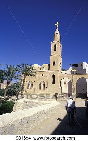 Picture - St Anthony's Monastery And Lone Man Walking, Red Sea, Egypt; Red Sea, Egypt. Fotosearch