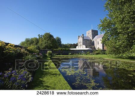 Stock Photo - St. Cross church and garden; Winchester, Hampshire, England. Fotosearch