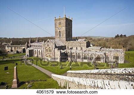 Stock Photo - St. David's Cathedral, built in its present form in 1181, with Bishops Palace in background; St. David, Pembrokeshire, Wales. Fotosearch