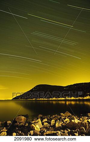 St. Lawrence River And Star Trails In Charlevoix Region; Port-Au-Persil Quebec Canada View Large Photo Image Stock Image - St. Lawrence River And Star Trails In Charlevoix Region; Port-Au-Persil Quebec Canada. Fotosearch