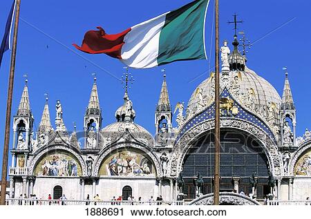 Stock Image - St Marks Cathedral And Italian Flag. Fotosearch