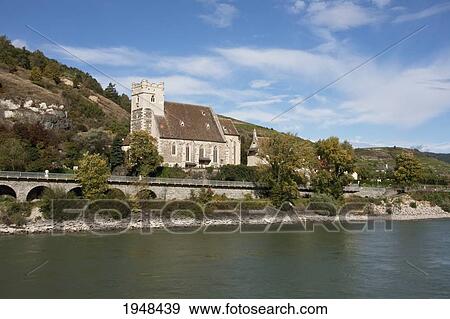 St. Michael Church, as seen from the Danube River in Wachau, Lower Austria, Austria View Large Photo Image Stock Photo - St. Michael Church, as seen from the Danube River in Wachau, Lower Austria, Austria. Fotosearch