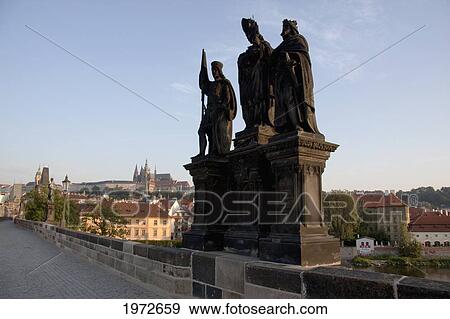Stock Photo - St. Norbert, St. Wenceslas And St. Sigismund Sculpture On The Charles Bridge, Prague, Czech Republic. Fotosearch