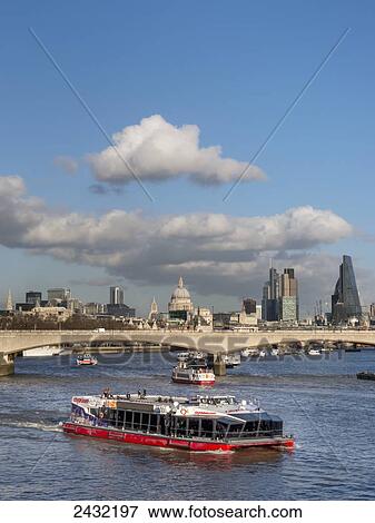 St Paul's Cathedral, bridge, tour boats and skyline; London, England View Large Photo Image Stock Photo - St Paul's Cathedral, bridge, tour boats and skyline; London, England. Fotosearch