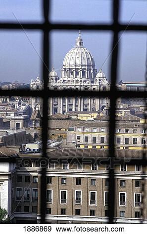 Stock Photo - St Peters Cathedral And The Vatican As Seen Through Window Panes. Fotosearch