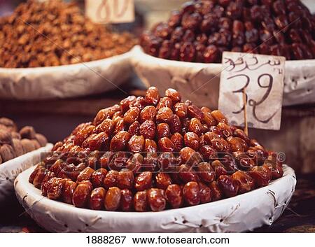 Stack Of Dates Ready To Sell At Market. View Large Photo Image Stock Photo - Stack Of Dates Ready To Sell At Market.. Fotosearch