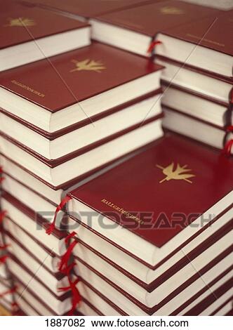 Stock Image - Stack Of Red Bibles. Fotosearch