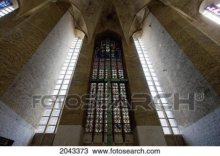 Stock Image - Stained Glass Window In The Church Of St. Mary, Stralsund, Germany. Fotosearch