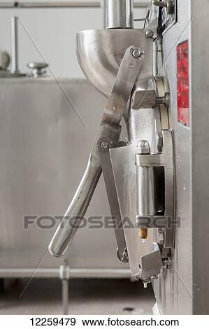 Stainless steel ice cream machine; Baltimore, Maryland, United States of America View Large Photo Image Stock Photo - Stainless steel ice cream machine; Baltimore, Maryland, United States of America. Fotosearch