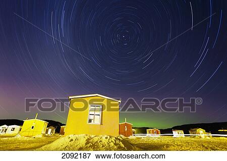 Star Trails And Ice Fishing Huts On Saguenay River; Saguenay Lac-Saint-Jean Quebec Canada View Large Photo Image Stock Photo - Star Trails And Ice Fishing Huts On Saguenay River; Saguenay Lac-Saint-Jean Quebec Canada. Fotosearch
