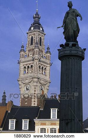Stock Photo - Statue And Clock Tower In Lille. Fotosearch