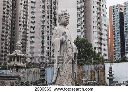 Statue And Residential Buildings At Panjiayuan Antique Market; Beijing, China View Large Photo Image Stock Image - Statue And Residential Buildings At Panjiayuan Antique Market; Beijing, China. Fotosearch