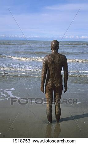 Statue At Crosby Beach, Liverpool, England, Uk View Large Photo Image Stock Image - Statue At Crosby Beach, Liverpool, England, Uk. Fotosearch